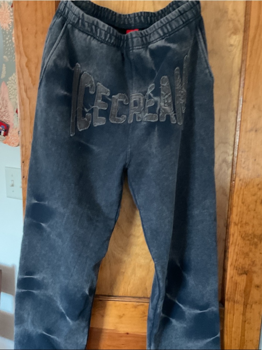 Icecream Red Logo Tag on Dark Gray Garment
